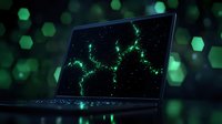 Modern laptop displaying glowing green fractal pattern against dark background with bokeh hexagonal lights, suitable for technology and cybersecurity concepts.