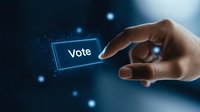 Hand reaching to touch glowing digital vote button on dark blue background with bokeh light effects, representing modern electronic voting system.