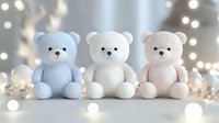 Knitted teddy bears in pastel blue, white and pink sitting in row with soft bokeh lights background, creating gentle nursery atmosphere for baby decor.