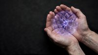 Elderly hands cupping a glowing purple plasma energy orb with electric lightning bolts, dark background, science and power concept.