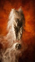 Dramatic flour explosion with white powder bursting against warm orange background creating dynamic motion and texture for culinary designs.