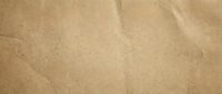Fine golden sand texture with natural ripples and smooth surface for beach vacation backgrounds and summer design projects.