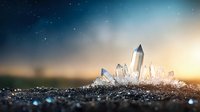 Clear quartz crystal cluster emerging from dark ground against starry sunset sky, glowing with mystical light. Natural mineral formation with prismatic points.