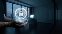 Trust and security concept with glowing padlock icon displayed in hand of male professional in modern office environment with city skyline view.