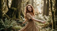 Young redhead woman in flowing brown dress dancing freely in enchanted moss-covered forest with soft natural lighting for lifestyle and wellness concepts.