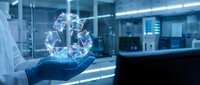 Young professional in sterile lab environment holding glowing digital hologram of molecular structure, representing biotechnology innovation and scientific research advancement.