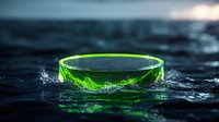 Green glass bowl floating on dark water surface with splashes and ripples creating dramatic lighting effects for kitchen and dining concepts.