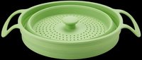 Green silicone collapsible steamer basket with lid and handles, isolated on transparent background. Great for kitchen clipart, stickers, t-shirt design, and print on demand.