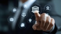 Male hand touching digital interface with legal and banking icons on dark background, demonstrating modern financial technology and digital banking services.