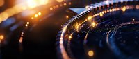 Abstract digital technology background with glowing particles and light trails creating futuristic circular patterns on dark backdrop.