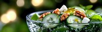 Fresh cucumber salad with herbs and nuts in glass bowl on wooden table with warm bokeh lights creating cozy dining atmosphere for healthy meal preparation.