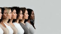 Diverse group of women in profile showing multicultural beauty and unity in neutral clothing against light background for inclusivity campaigns.
