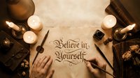 Vintage calligraphy workspace with believe in yourself motivational quote, candles, quill pen and hands writing on aged parchment for inspiration projects.