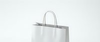 White paper shopping bag with twisted handles on clean background for retail branding and commercial use.