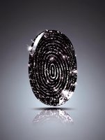 Glowing black fingerprint with sparkling diamond texture against dark background, floating with reflection. Concept of luxury biometric security and identity.