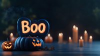 Black pumpkins with glowing faces and illuminated Boo sign on dark background with burning candles creating spooky Halloween atmosphere.
