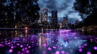 Illuminated cityscape with glowing purple bokeh reflections on water surface at twilight, dramatic storm clouds above modern skyscrapers create moody urban atmosphere.