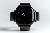 Modern black smartwatch with square display showing analog clock face on minimalist white background. Sleek wearable technology for digital lifestyle.