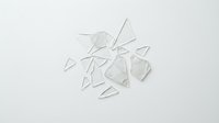 Scattered transparent glass shards and fragments isolated on white background, ready for design projects, overlays, and digital compositions.