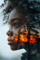 Creative double exposure portrait combining profile view with forest sunset silhouette. Artistic photography perfect for themes of inner reflection, nature connection, and personal growth.