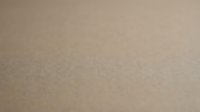 Soft beige textured paper background with subtle grain pattern for elegant design projects and creative layouts.