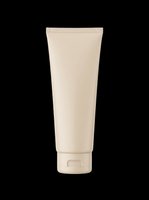 Blank beige cosmetic tube isolated on transparent background, ready for T-shirt design, stickers, print on demand, sublimation, and clipart use.