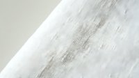 White linen fabric texture with natural weave pattern and soft drape for textile design and fashion projects.