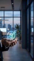 Businessman hands holding glowing growth arrow icon in modern office environment representing success and financial progress in corporate setting.