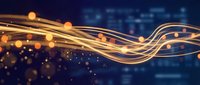 Golden flowing light streams with glowing particles on dark blue background. Abstract energy waves and luminous bokeh effects for modern digital design projects.