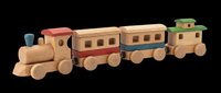 Wooden toy train set with locomotive, passenger cars, and caboose isolated on transparent background. Ready for clipart, print-on-demand products, stickers, and sublimation designs.
