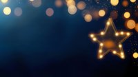 Glowing golden star with warm LED lights against dark blue background with blurred bokeh lights creating magical festive atmosphere for holiday designs.