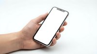 Hand holding modern smartphone with blank white screen isolated on white background for app presentation and mobile technology mockup.