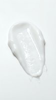 White cosmetic cream or lotion smear isolated on light background, suitable for skincare product packaging, beauty advertising, and cosmetics marketing materials.
