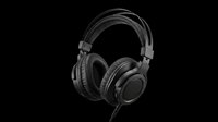 Over-ear wired headphones in matte black, isolated on transparent background. Ready for tech product design, stickers, print on demand, clipart, and t-shirt use.