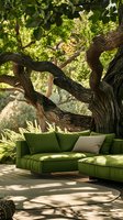 Modern green outdoor sectional sofa under twisted tree branches casting dappled shadows on wooden deck, creating luxurious garden lounge area with natural sunlight filtering through.