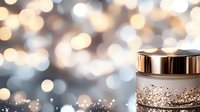 Luxurious cosmetic cream jar with gold sparkles and bokeh lights on blurred background, elegant skincare product photography for beauty industry promotion.