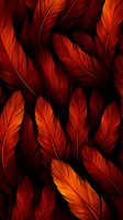 Rich orange and deep red feathers arranged in overlapping pattern against dark background, creating dramatic texture for nature-inspired designs.