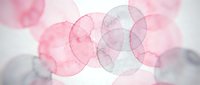 Abstract watercolor circles in soft pink and gray tones creating elegant overlapping geometric pattern for modern design projects and artistic backgrounds.