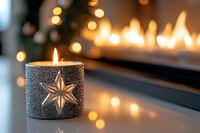 Glowing star candle holder with fireplace and bokeh lights in background creates cozy winter atmosphere for holiday season and home decor designs.