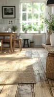 Bright Scandinavian kitchen interior with natural light streaming through large windows, wooden dining table, woven rug, potted plants in ceramic vase, and minimalist decor for home design projects.