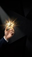 Businessman hand holding glowing shield with padlock icon and golden light rays against dark background, representing data protection, cybersecurity, and digital safety for business concepts.