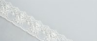 White lace trim with intricate floral embroidery pattern on neutral background, isolated for textile design, fashion, and craft projects.