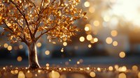 Golden tree with glowing leaves against blurred bokeh background creates magical autumn atmosphere for seasonal greeting cards and festive designs.