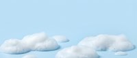 Fluffy white clouds isolated on soft blue background, ready for design projects, web graphics, and creative compositions.