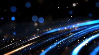 Glowing blue and gold light trails with bokeh effects on dark background create dynamic motion and energy for technology and abstract designs.