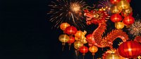 Red dragon lantern with golden fireworks and traditional paper lanterns creating festive celebration atmosphere on dark background for holiday decorations.