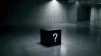 Dark mysterious room with black cube displaying white question mark symbol in spotlight creating dramatic atmosphere for business concepts.