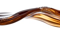 Flowing amber liquid wave with golden highlights and bubbles on white background for beverage and cosmetic design projects.