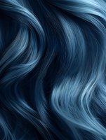 Flowing waves of dark blue hair create dynamic curves and movement against black background, highlighting silky texture and ethereal light effects.