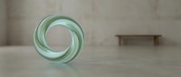 Translucent green glass torus sculpture on polished concrete floor with minimalist interior setting, contemporary art and design element.